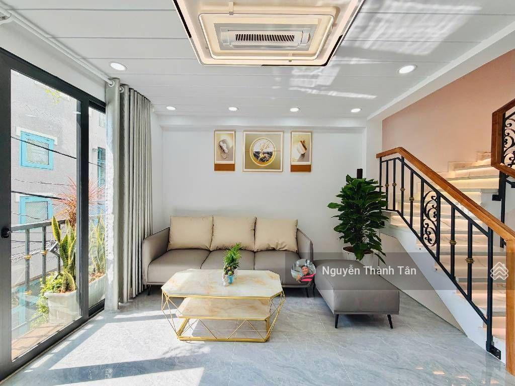 Gần dương quảng hàm, hẻm xe hơi, 5 tầng mua về vừa ở vừa cho thuê  40m2 (4x10)