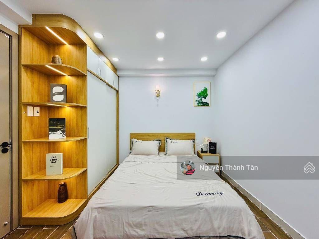 Gần dương quảng hàm, hẻm xe hơi, 5 tầng mua về vừa ở vừa cho thuê  40m2 (4x10)