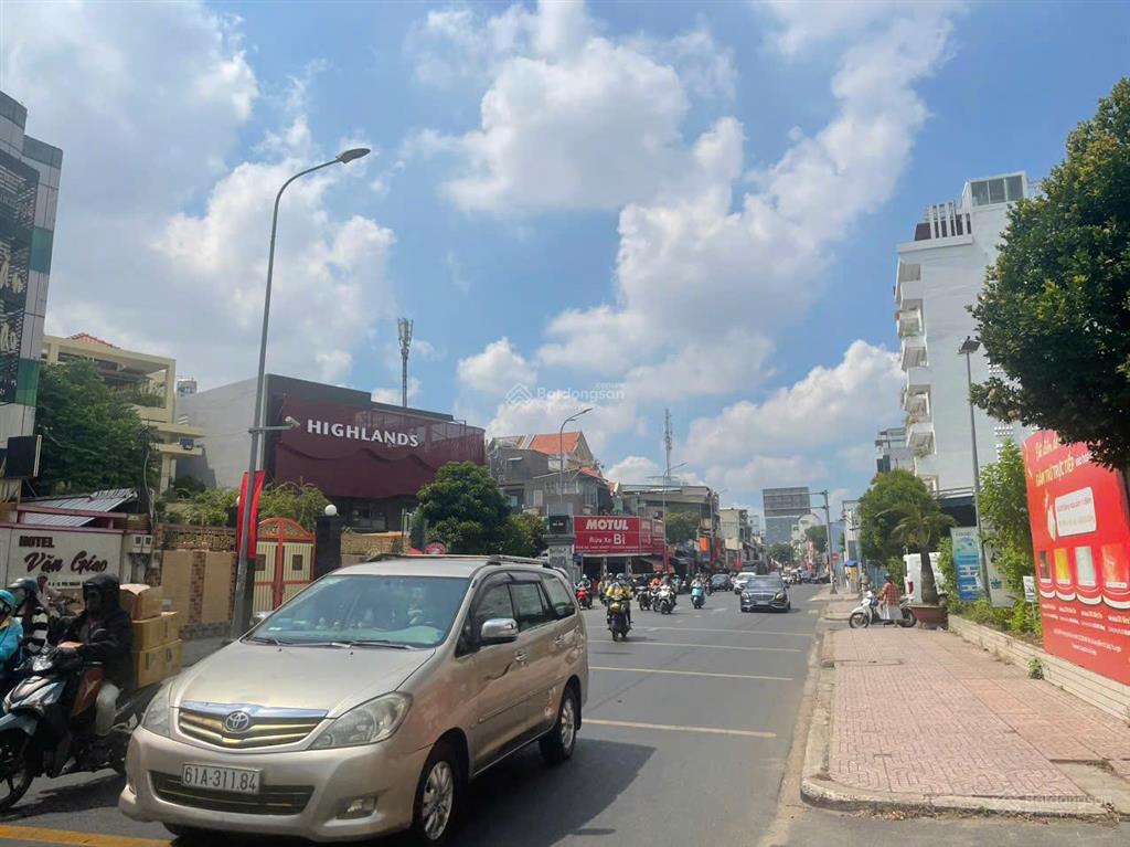 Gấp  siêu phẩm  khan hiếm mt nguyễn kiệm, dt 8.6x38m, 4 tầng, hđt 120tr/tháng, 61 tỷ