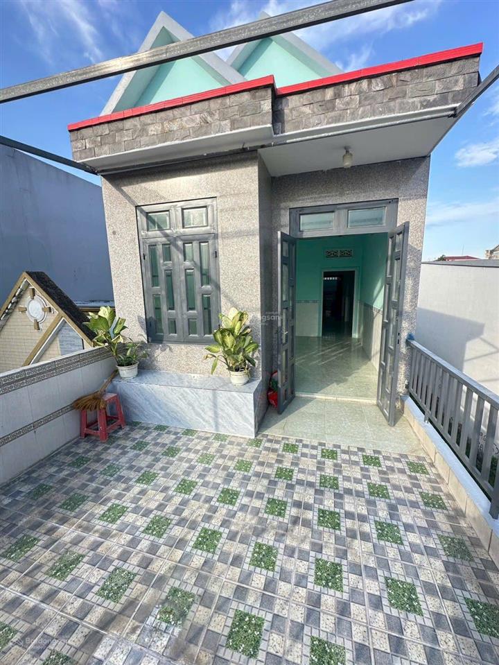 Nhà gần chợ dĩ an 1, phường dĩ an, tp dĩ an. giá 4,5 tỷ tl. diện tích 80m2 (4x20m), thổ cư 50m2.