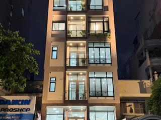 Tòa nhà vp mt ngang 8m đường đào duy anh, phú nhuận có hầm xe, thang máy, pccc nhà mới xây
