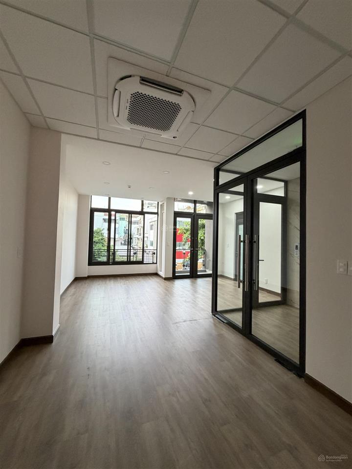 Tòa nhà vp mt ngang 8m đường đào duy anh, phú nhuận có hầm xe, thang máy, pccc nhà mới xây