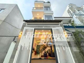 Nhà 4 tầng hẻm xe hơi sát mặt tiền huỳnh tấn phát