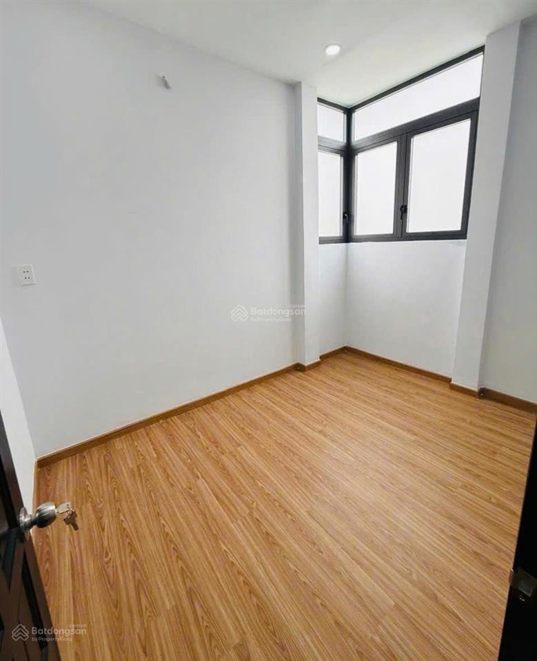 4 tầng tân phú  2pn 3wc sân thượng  hoàn công  2,x tỷ  sát hẻm xe hơi  tân hương  ngang 4,1m