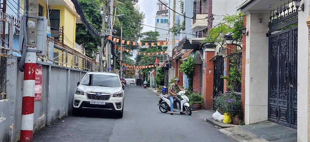 Bán ch 15 phòng đang cho thuê 74tr/tháng hẻm xe hơi 7m thẳng thông 70m2 giá 26 tỷ tl