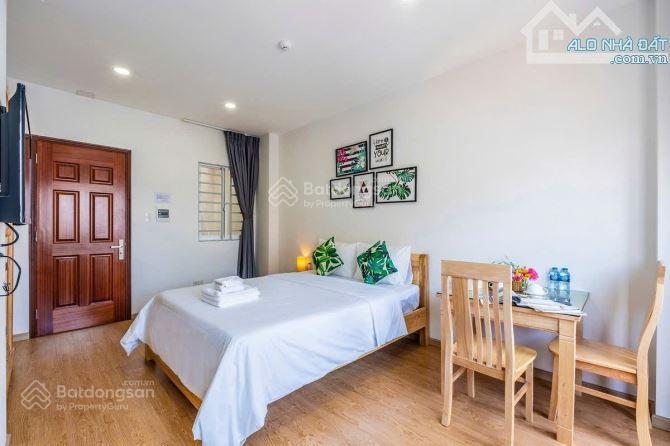 Bán toà chdv phổ quang, p. 2, q. tân bình.dt 7x24m. kc hầm, 6 tầng. hđt 190tr/th. giá chỉ 26 tỷ