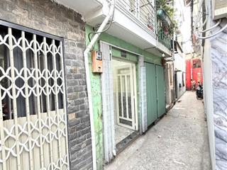 Bán nhà sổ hồng riêng  2 lầu  hẻm thông  quận 7