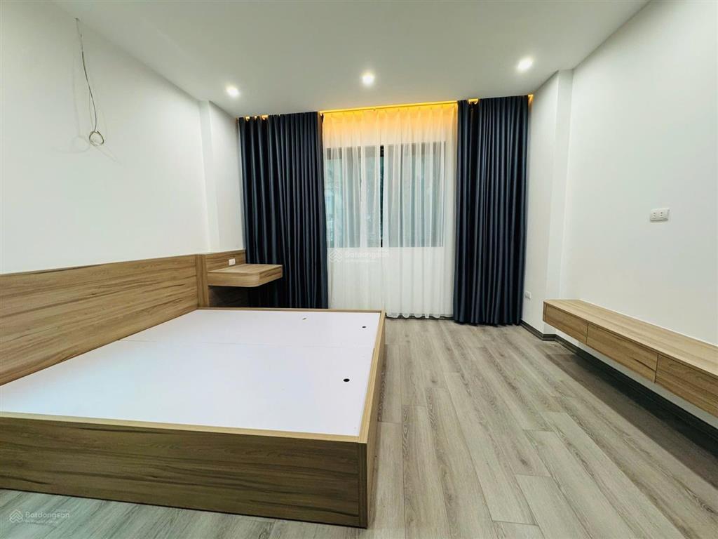Cầu cốc tây mỗ 6 tầng 32m2  thang máy  oto đỗ cổng 6,x tỷ ngõ trước nhà 2m, 10m ra ô tô tránh