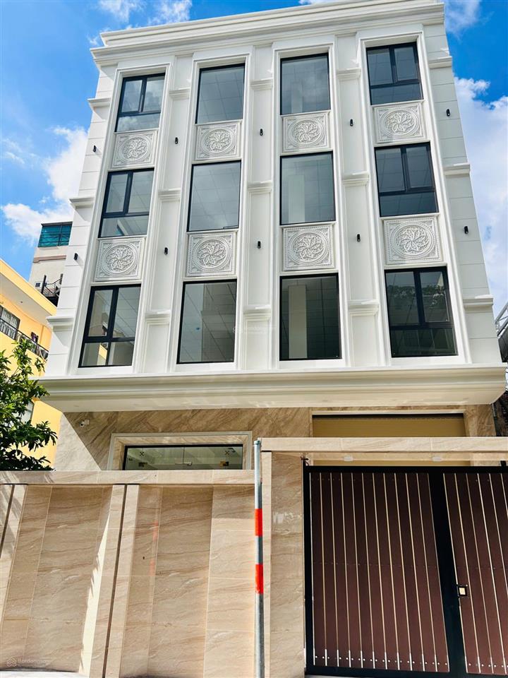 Tòa nhà khu bàu cát 10x20m hầm trệt 4 lầu có thang máy, cho thuê