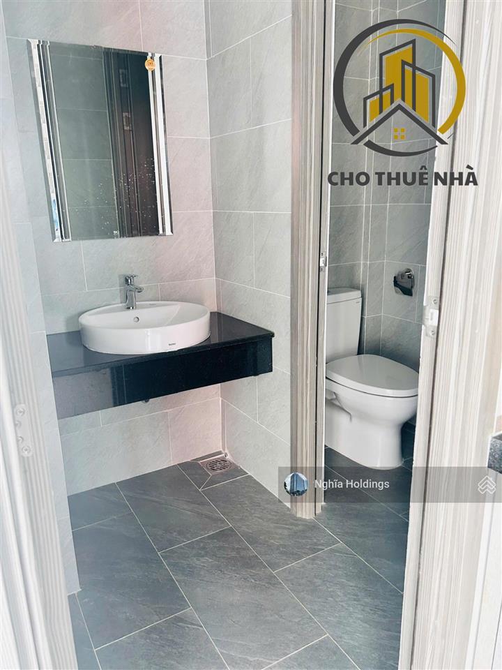 Tòa nhà mặt tiền đường lê trung nghĩa khu k300 diện tích 7x20m trệt 5 lầu cho thuê