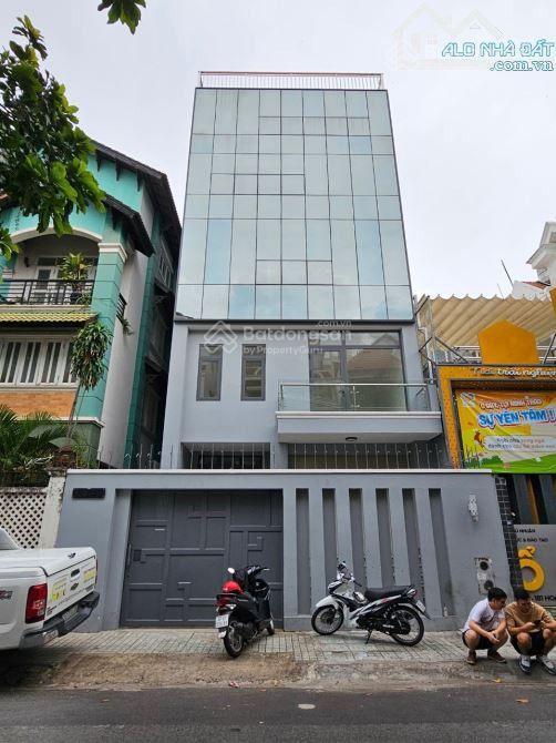 Bán nhà mt hoa lan.phường 2.phú nhuận.dt 8x16m.kc hầm 5 tầng. giá 50 tỷ tl.