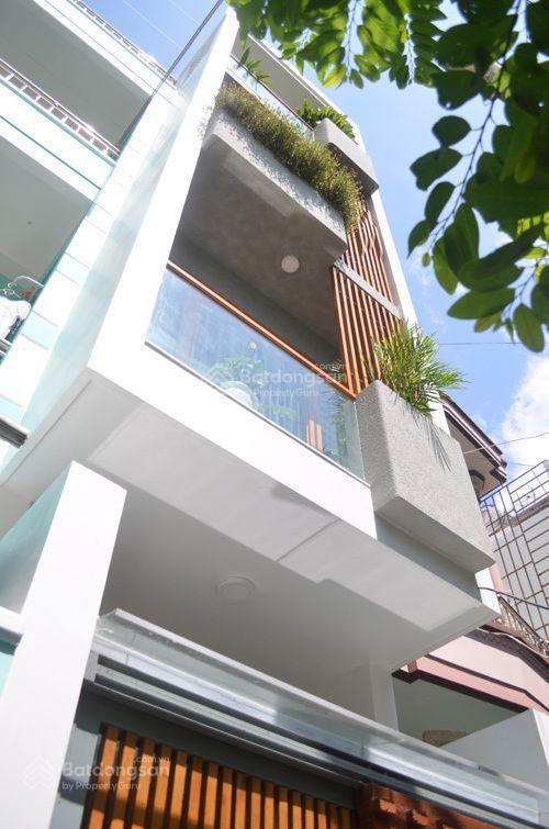 Bán nhà 5 tấm bến vân đồn q. 4  khu dân cư