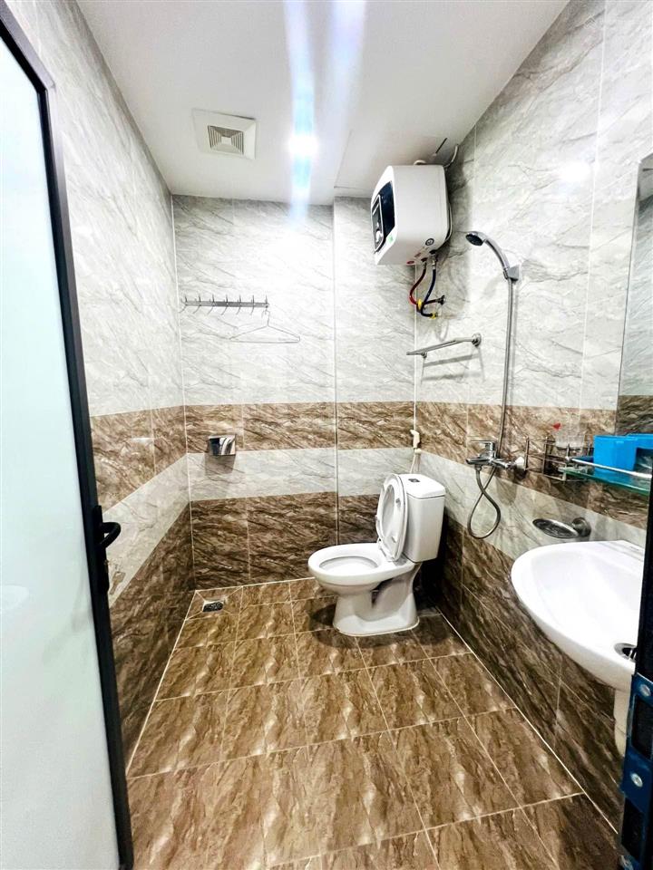Nhà trương định ô tô dừng đỗ trước cửa hai thoáng vĩnh viễn