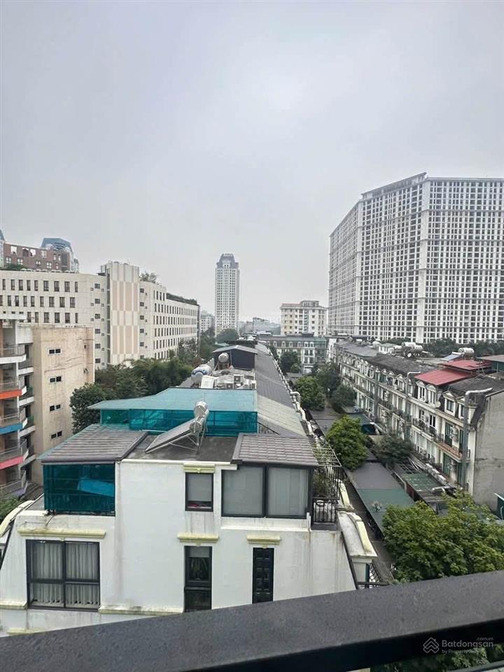 Tòa văn phòng đình thôn  77m²  7 tầng thang máy  lô góc  ô tô tránh  dòng tiền 1 tỷ/năm