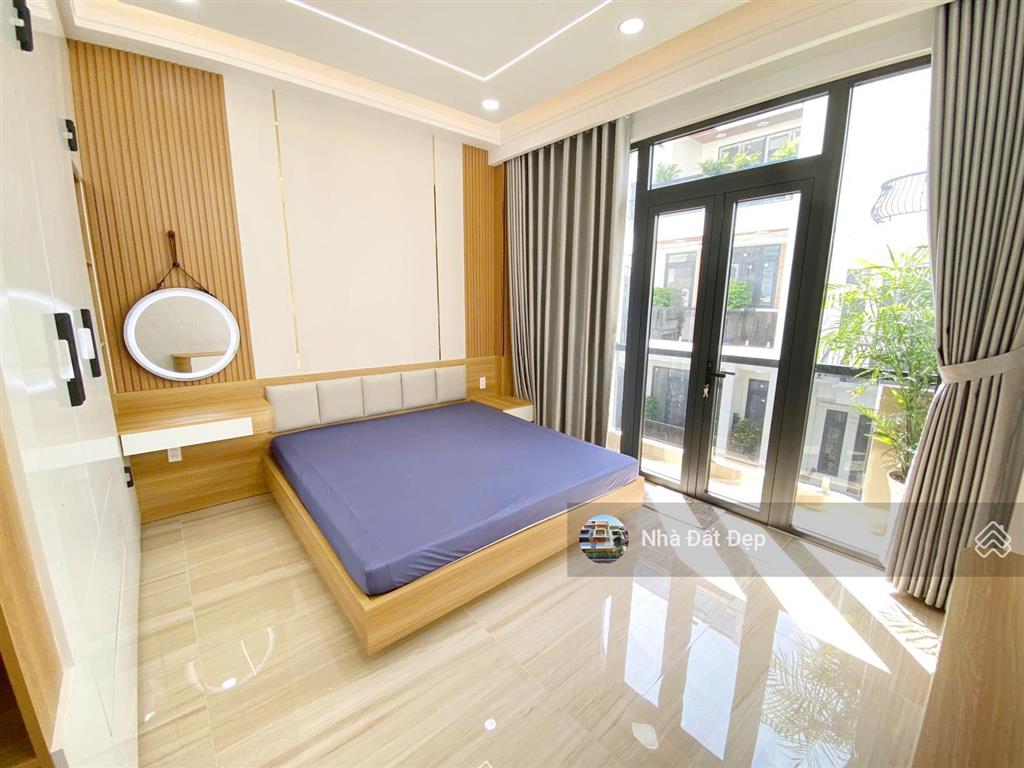 Nhà mới có thang máy 5 tấm đường nhựa đẹp 8m có vỉa hè full nội thất 4x15m đường hương lộ 2