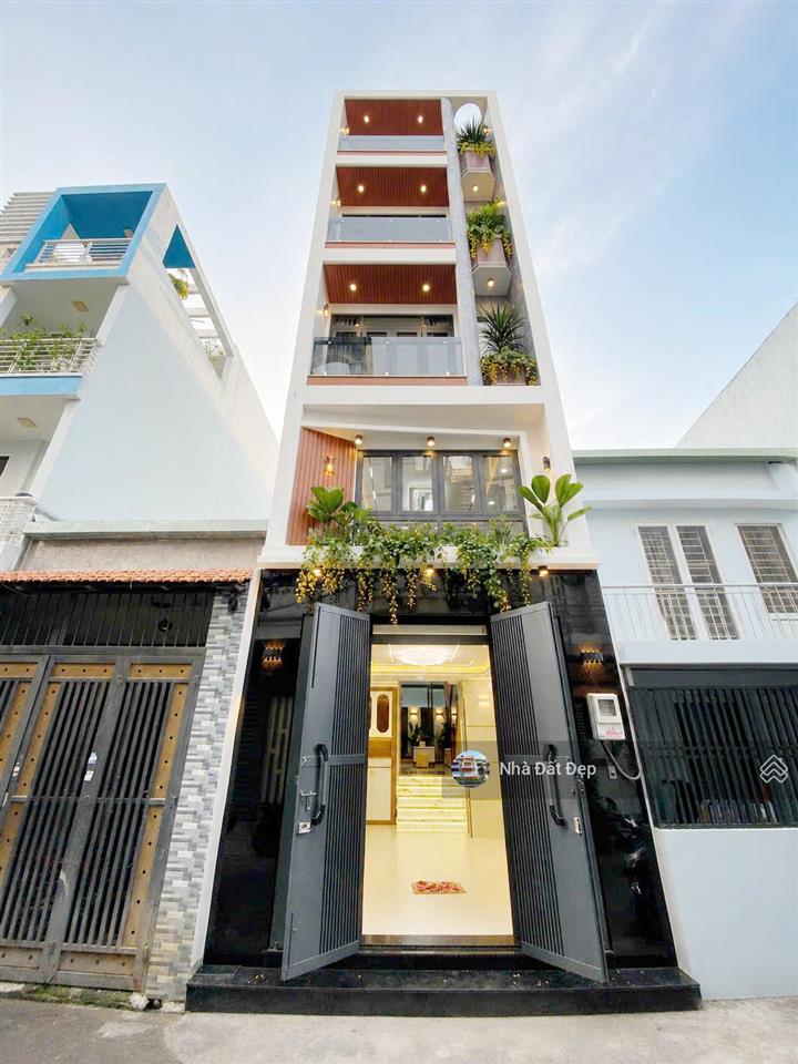 Nhà mới 5 tấm, có thang máy, full nội thất 4x15m hẻm nhựa đẹp 8m 1 sẹc lê văn quới