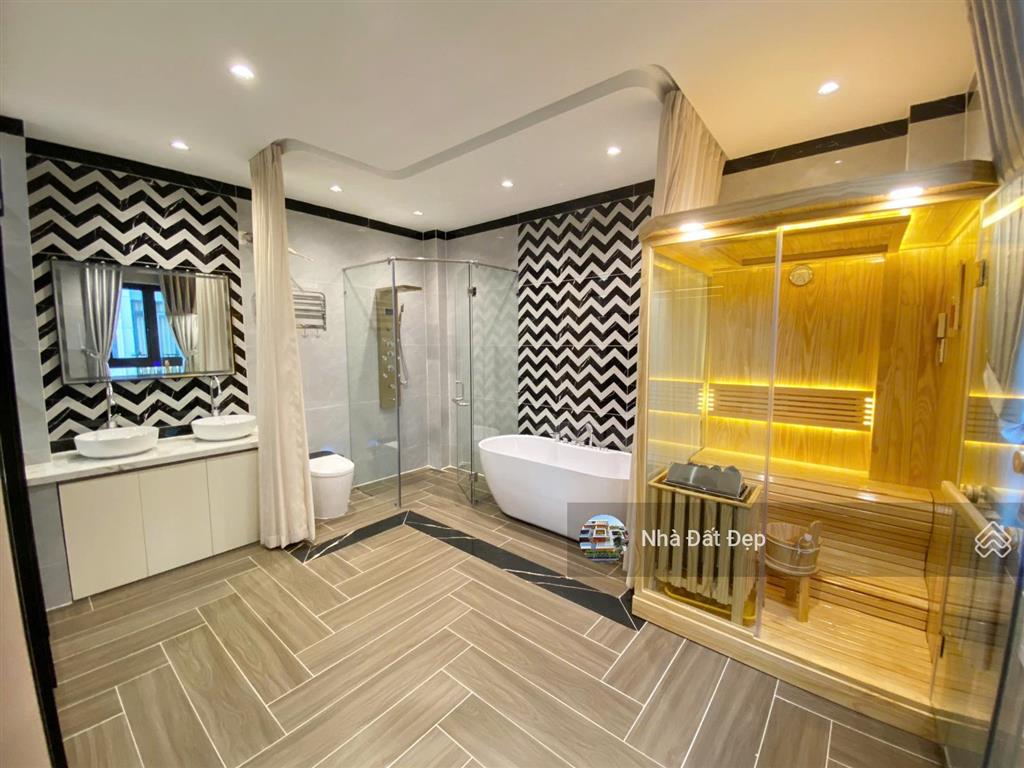 Nhà mới góc 2 mặt tiền có thang máy 5,5 tấm full nội thất 4,8x14m. đường nhựa 8m lê văn quới