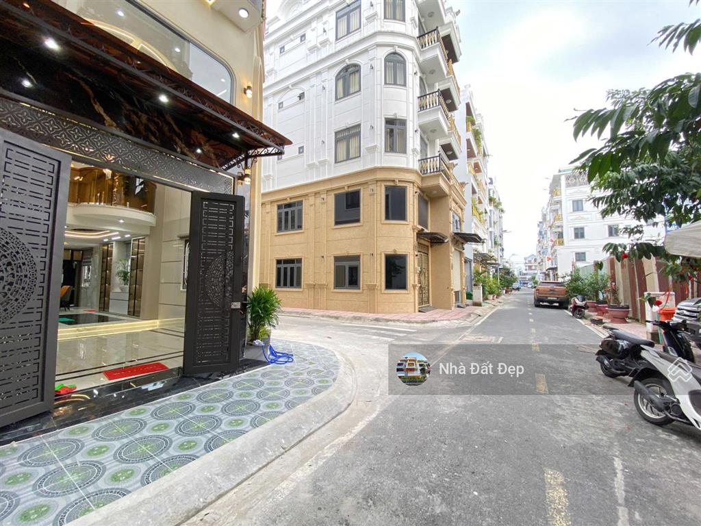 Nhà mới góc 2 mặt tiền có thang máy 5,5 tấm full nội thất 4,8x14m. đường nhựa 8m lê văn quới