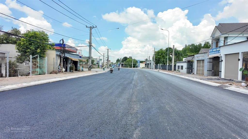 Bán lô đất mặt tiền kinh doanh buôn bán ngay, đường nhựa 32m, sổ riêng, thổ cư ngay chợ thạnh phú