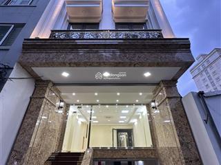 Cho thuê nhà mới hoàng cầu  đặng tiến đông, 90m2 x 7 tầng, 1 hầm mt 6m, thông sàn, thang máy, 50tr