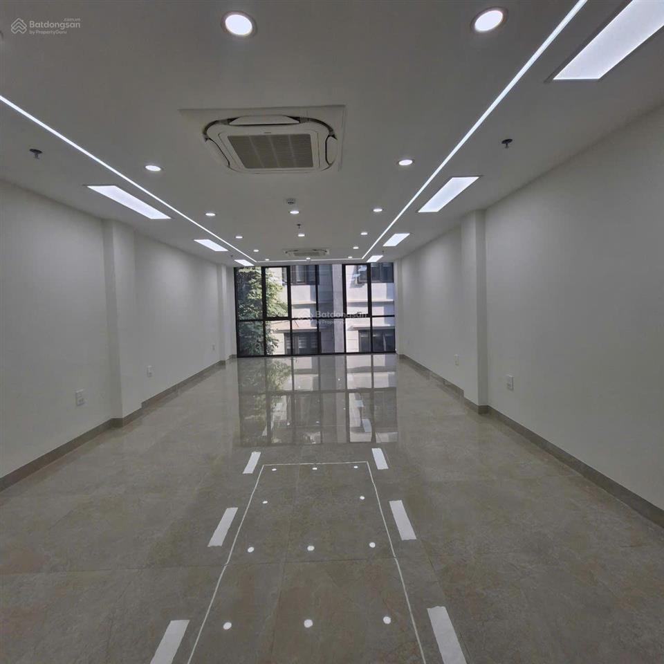 Cho thuê nhà mới hoàng cầu  đặng tiến đông, 90m2 x 7 tầng, 1 hầm mt 6m, thông sàn, thang máy, 50tr