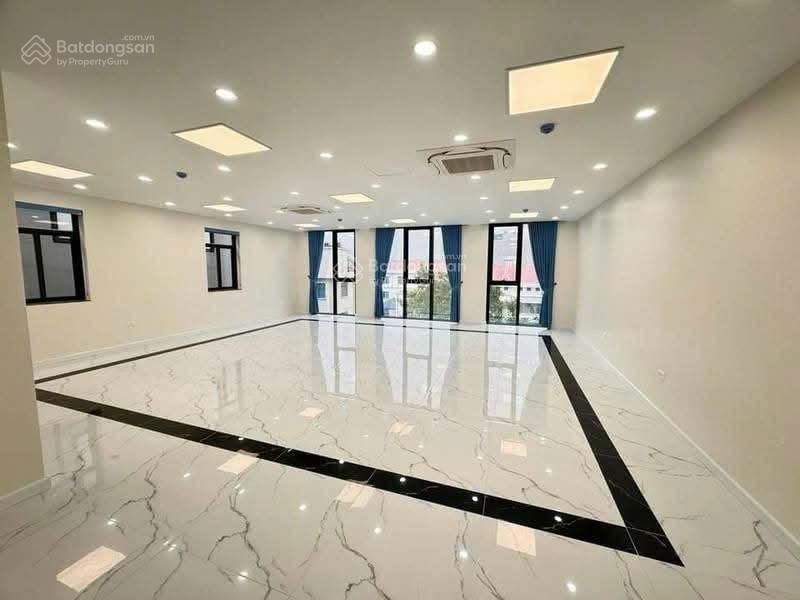 Cho thuê toà nhà phố vũ phạm hàm 90m2 x 7 tầng, thông sàn, thang máy nhập khẩu, full kính, 45tr/th