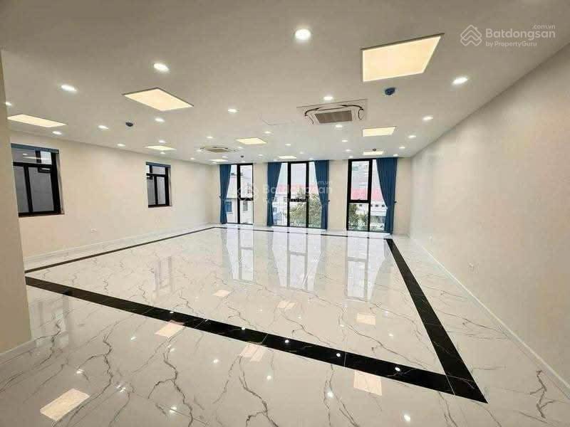 Cho thuê toà nhà phố vũ phạm hàm 90m2 x 7 tầng, thông sàn, thang máy nhập khẩu, full kính, 45tr/th