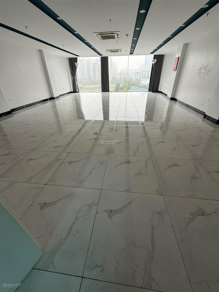 Cho thuê toà nhà phố vũ phạm hàm 90m2 x 7 tầng, thông sàn, thang máy nhập khẩu, full kính, 45tr/th