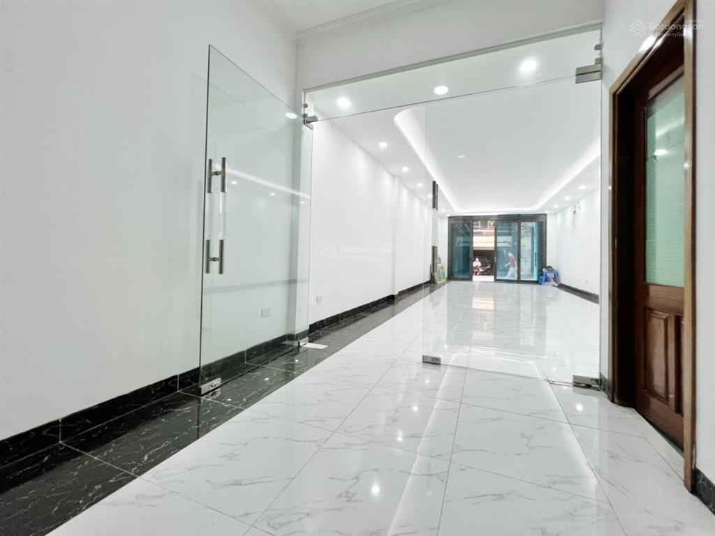 Cho thuê nhà trung kính  trung yên 100m2 7 tầng, thang máy, nhà full kính mới, 65tr/th