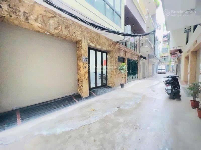 Nhà phân lô  ô tô tránh  6 tầng thang máy  kinh doanh đỉnh  hàng xóm quận uỷ đống đa