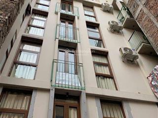 Siêu phẩm quận hai bà trưng  7 tầng thang máy  ô tô đỗ cửa, 30m ra phố  2 thoáng trước sau