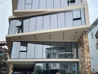 Tòa building  7 tầng  lô góc. 3 mặt thoáng  kinh doanh  vỉa hè. giá 5x tỷ.