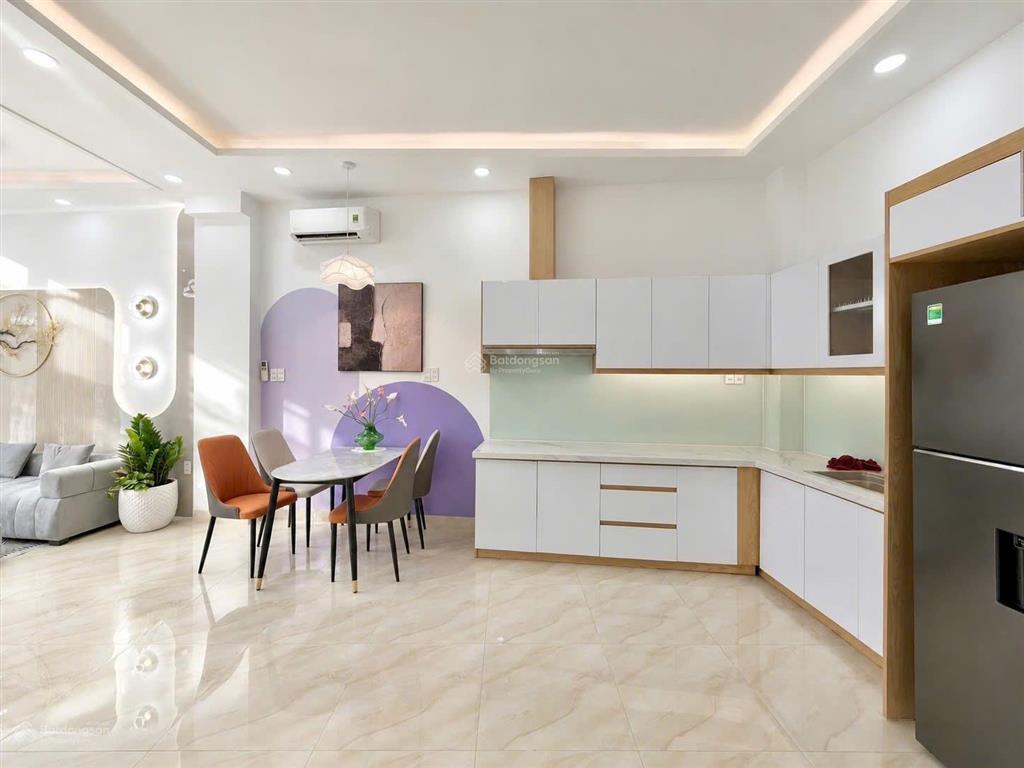Kinh đô thời trang lê văn sỹ giáp q3  41m2 x 4 tầng sân thượng mới cứng