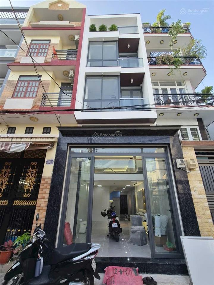 Bán nhà hẻm 6m, mới đẹp 4x14 đúc 5 tầng quận 11