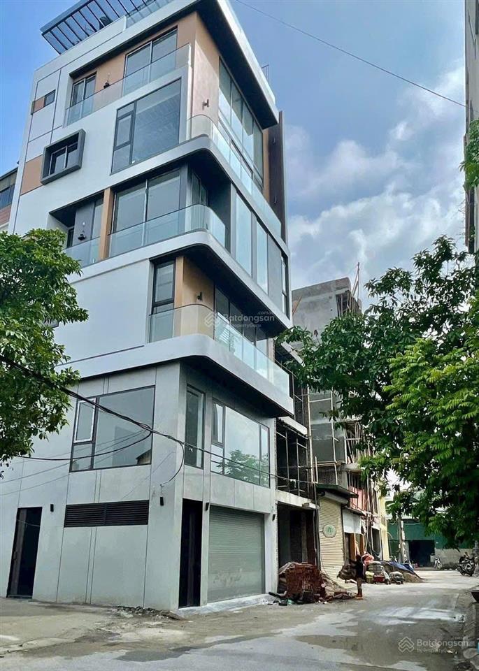 Bán nhà tđc cổ linh x6,7 tầng thang máy,60m mt 6.4m lô góc 2 mặt tiền thoáng sáng