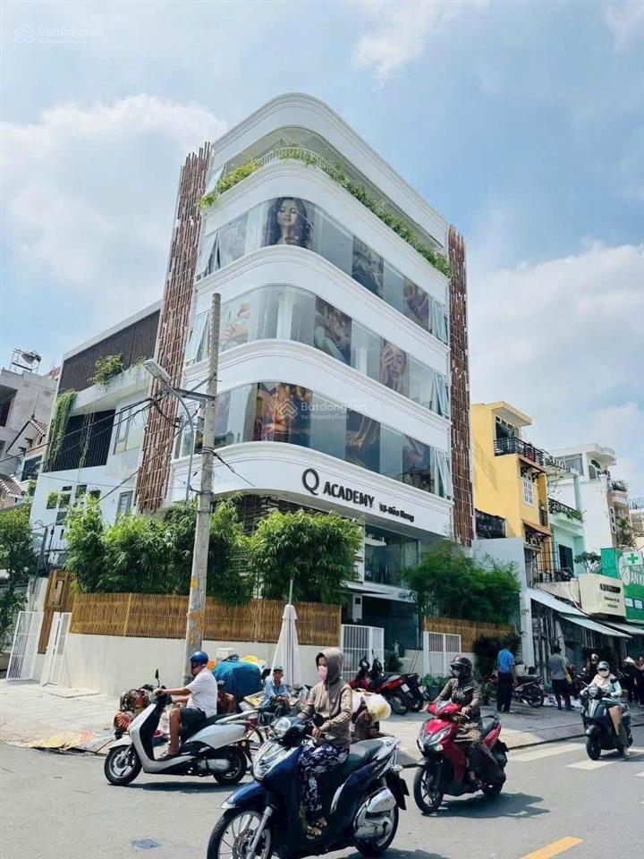 Tòa nhà góc 2mt lê văn sỹ, 7m x 20m. hầm 7 tầng, thang máy, sẵn hợp đồng thuê 120 triệu/tháng