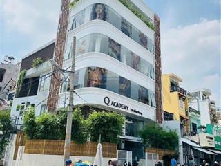 Tòa nhà góc 2mt lê văn sỹ, 7m x 20m. hầm 7 tầng, thang máy, sẵn hợp đồng thuê 120 triệu/tháng