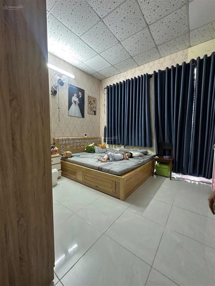 Nhà 2 tầng hẻm xe hơi thông 8m gần lê văn việt