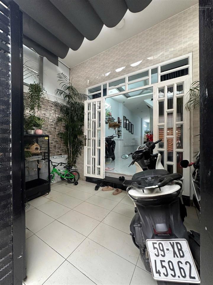 Nhà 2 tầng hẻm xe hơi thông 8m gần lê văn việt