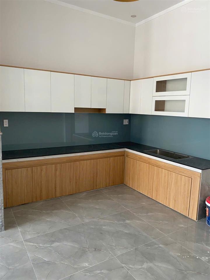 Bán gấp nhà 1 trệt 1 lầu đang hoàn thiện ngay kdc lavender sổ riêng thổ cư, tt 668tr nhận nhà ngay