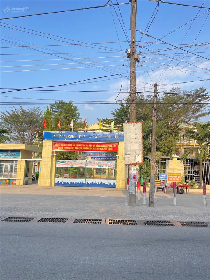 Bán gấp đất mặt tiền trường học thạnh phú, thuận tiện kinh doanh tại nhà. sổ hồng riêng thổ cư 100%