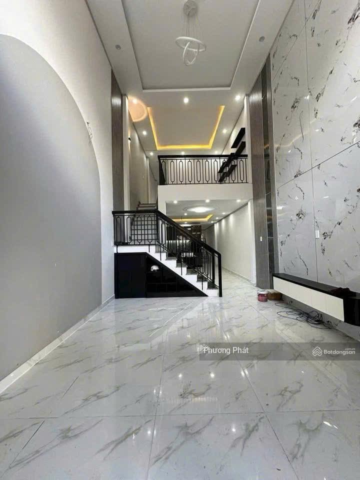 Bán gấp nhà 1 trệt 1 lửng đúc giá rẻ, sổ riêng thổ cư cách chợ thạnh phú 2km, tt 339tr nhận nhà ở