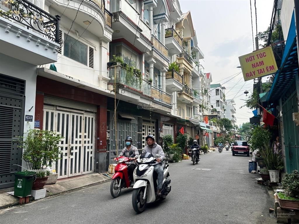 Q12 nhà 5 tầng đường nhựa thông 8m giá 5.6 tỷ tl khu vip nhà lầu đường thông ra lê văn khương