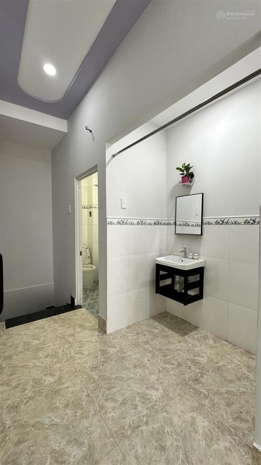 Bán nhà trần văn quang phường bảy hiền tân bình sau 1 căn mặt tiền 2 tầng 42m2 5.89t tl