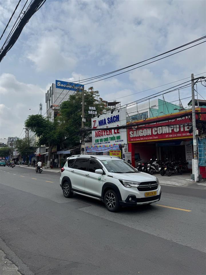 ~1700m2 tòa nhà 7 tầng mặt tiền lê quang định hd thuê khủng 1.7 tỷ ổn định, nhà mới vị trí siêu đẹp