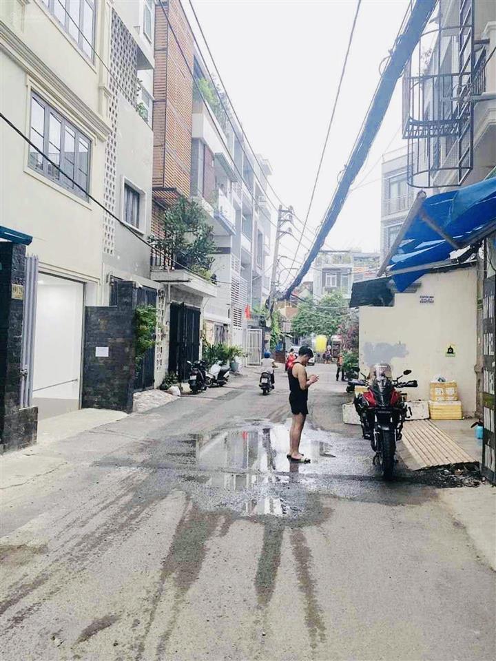 Nhà đẹp dòng tiền  dt (5*18)  7 tầng, hầm  hxh 6m  nguyễn kiệm  bán chỉ 14,4 tỷ.