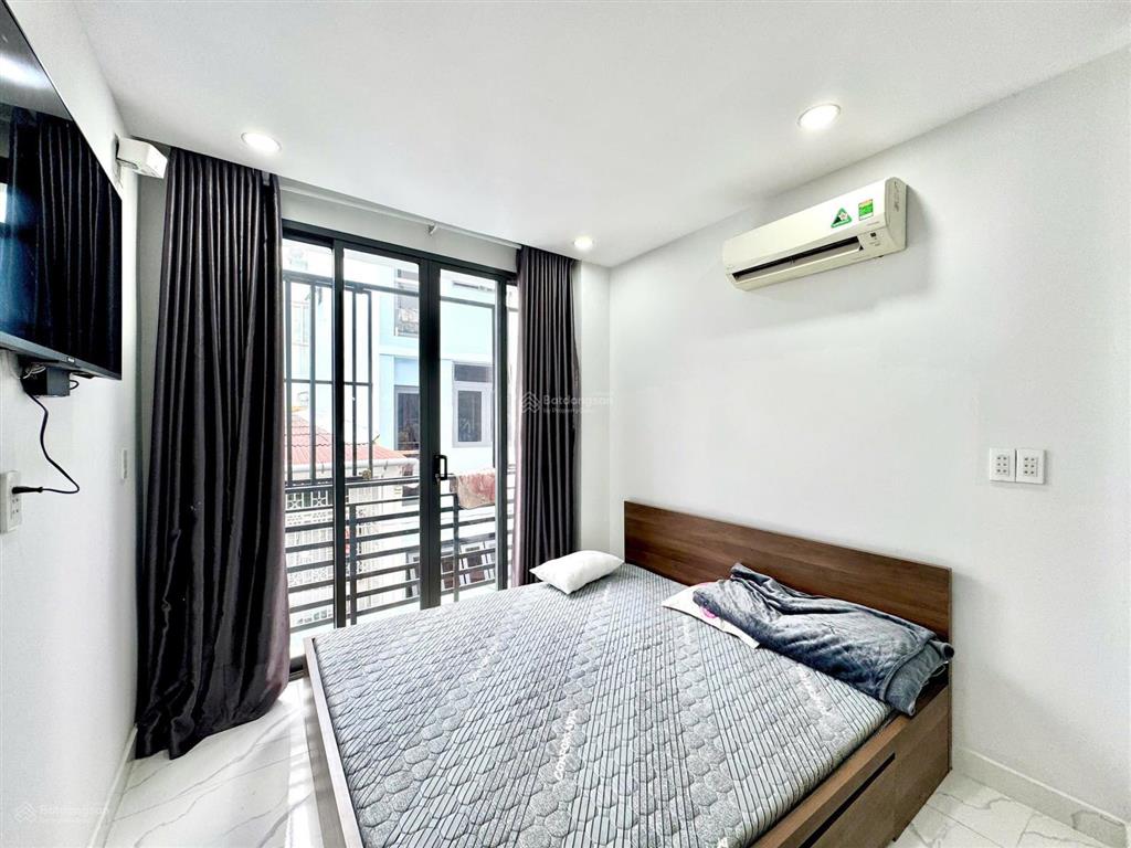 Căn hộ mới 100% tách bếp ban công ngay trung tâm quận 5  nguyễn trãi sát đhsg, đhsp, đh khtn