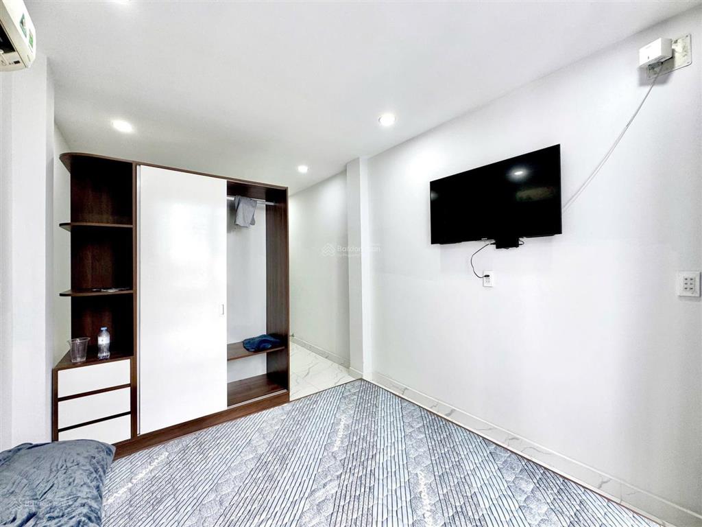 Căn hộ mới 100% tách bếp ban công ngay trung tâm quận 5  nguyễn trãi sát đhsg, đhsp, đh khtn