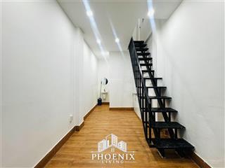 1 trệt 1 lầu cao 2m  mới xây  ban công ngay trường chinh  cầu tham lương