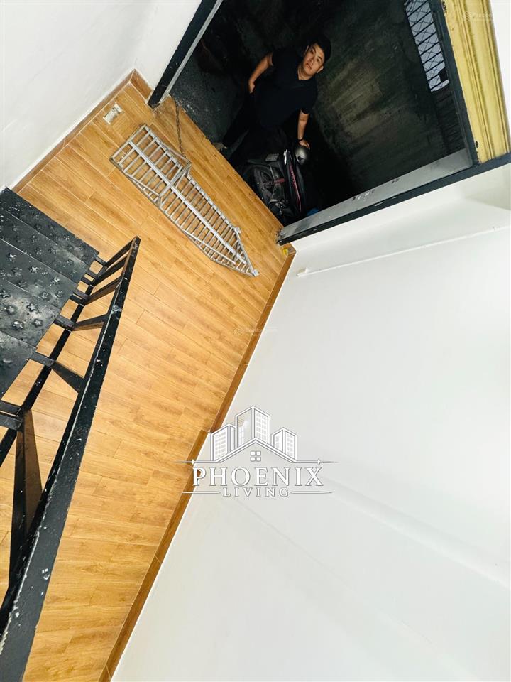 1 trệt 1 lầu cao 2m  mới xây  ban công ngay trường chinh  cầu tham lương